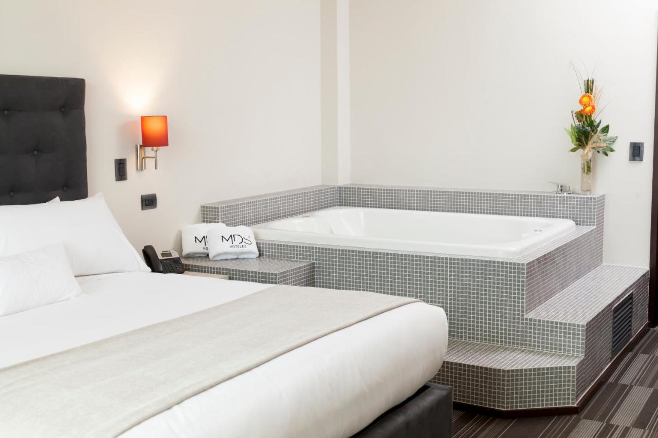 Mds Hotel Chillán Екстериор снимка A whirlpool tub in a hotel room